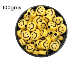 Cuentas plasticas pastilla amarilla carita negra